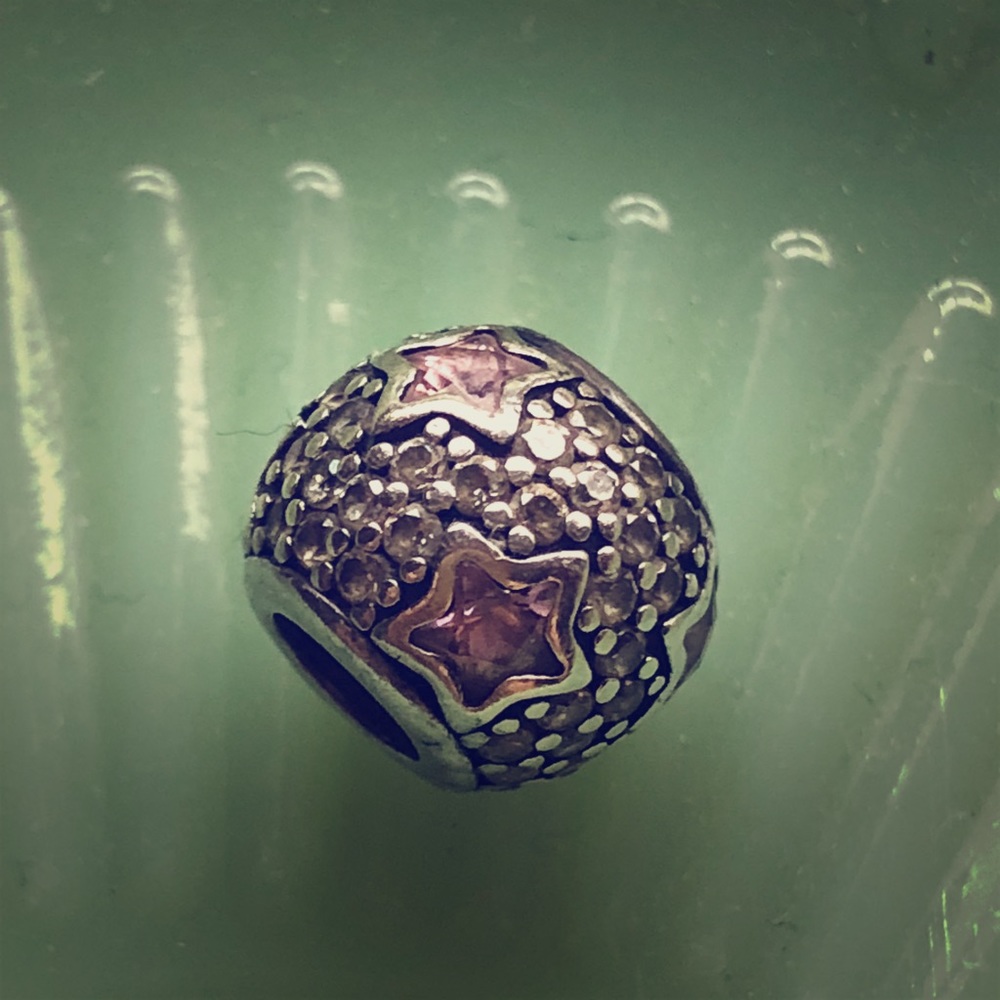 Pandora Follow the stars pink charm discontinued.